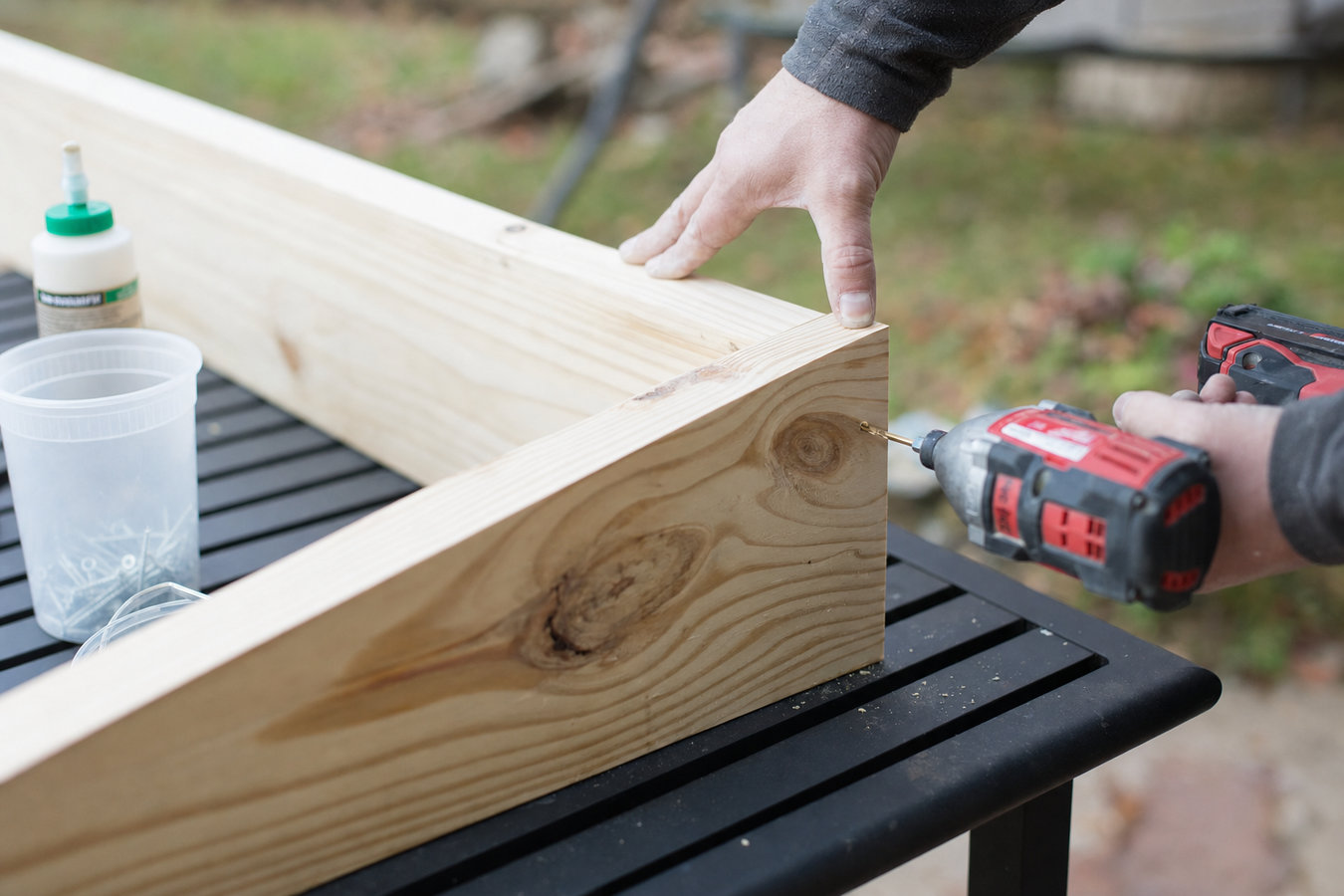 Pressure-treated wood deck construction